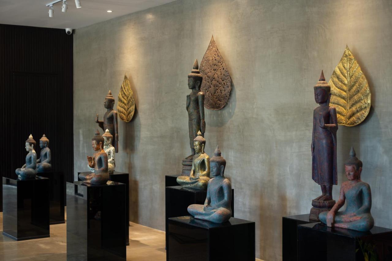 Eightfold Urban Resort Siem Reap Luaran gambar A collection of Thai and Laotian art
