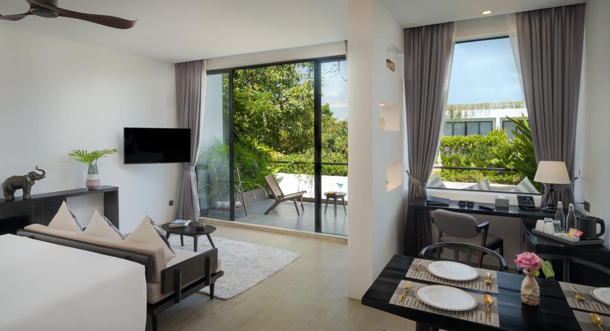 Eightfold Urban Resort Siem Reap Luaran gambar A living room at the hotel